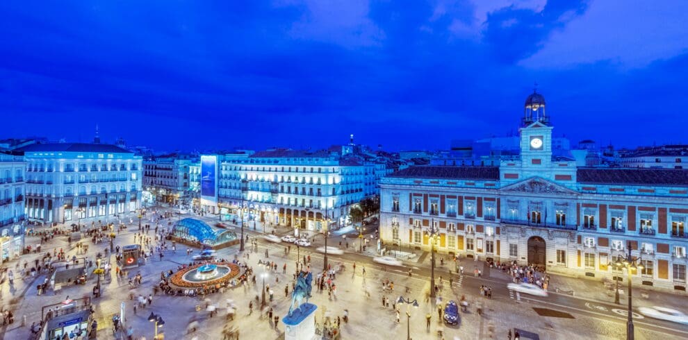 Madrid city tour by car - Ornate buildings illuminated at night, Madrid, Madrid, Spain